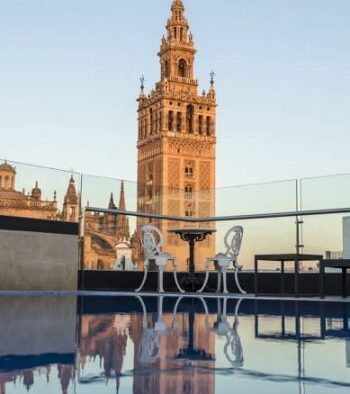 La Giralda from the roof top pool at 1800 hotel in Seville